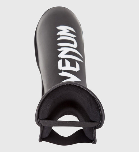 Paratibie da kickboxing Venum Challenger – Nero/Bianco – Paratibie