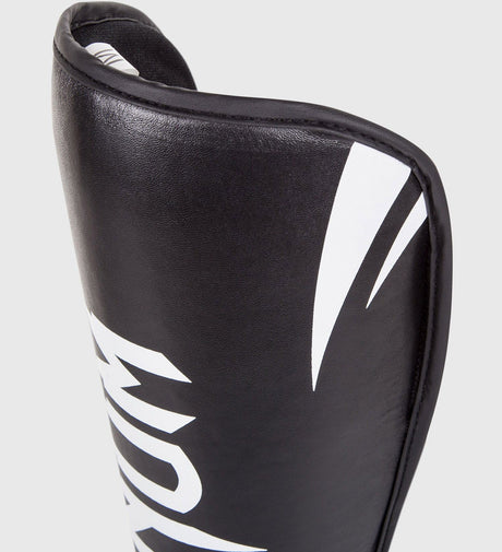Paratibie da kickboxing Venum Challenger – Nero/Bianco – Paratibie