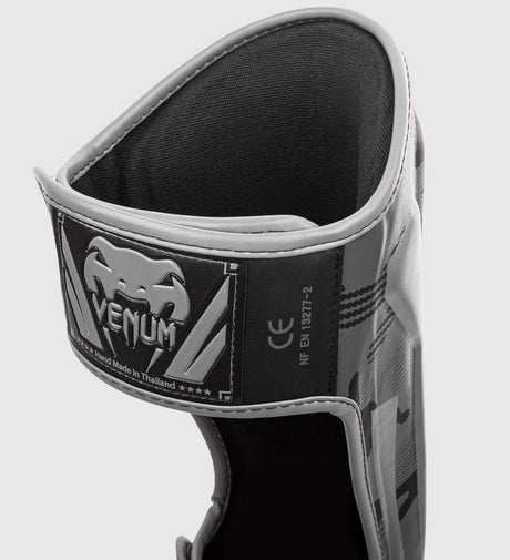 Paratibie da kickboxing Venum Elite – Camo Grigio – Paratibie
